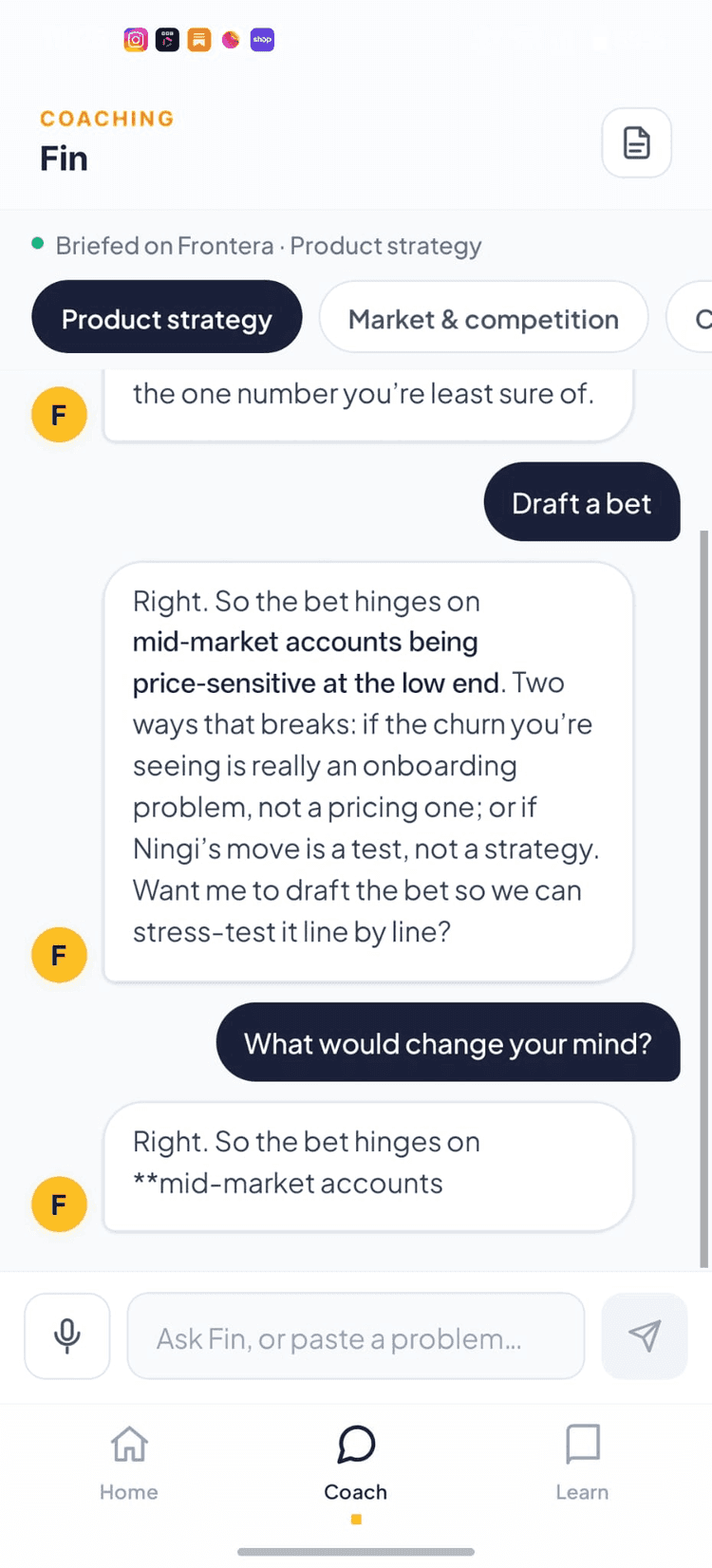Actuo mobile app coaching screen where Coach Fin pressure-tests strategy against new market entrants
